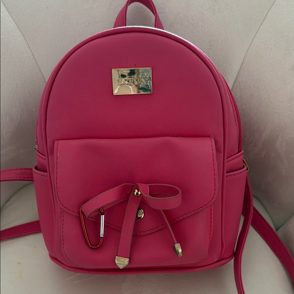 Pink Backpack by [Brand]